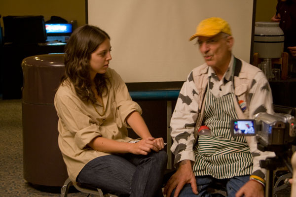 audience member being interviewed at a media station