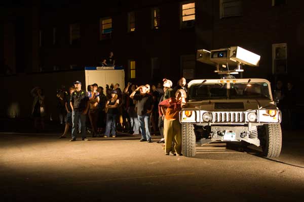 the crowd watches the Humvee in action